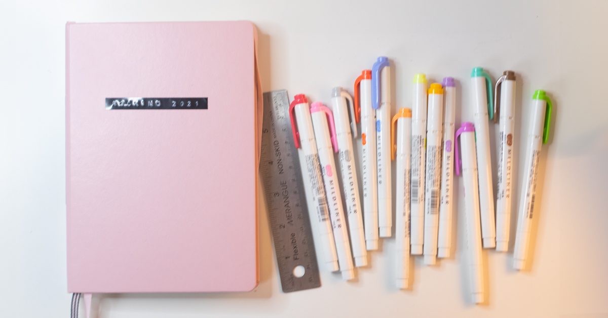 Bullet journal and pens